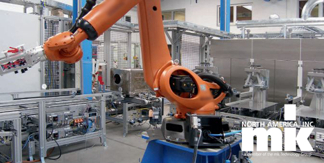 Robot with conveyors in the background