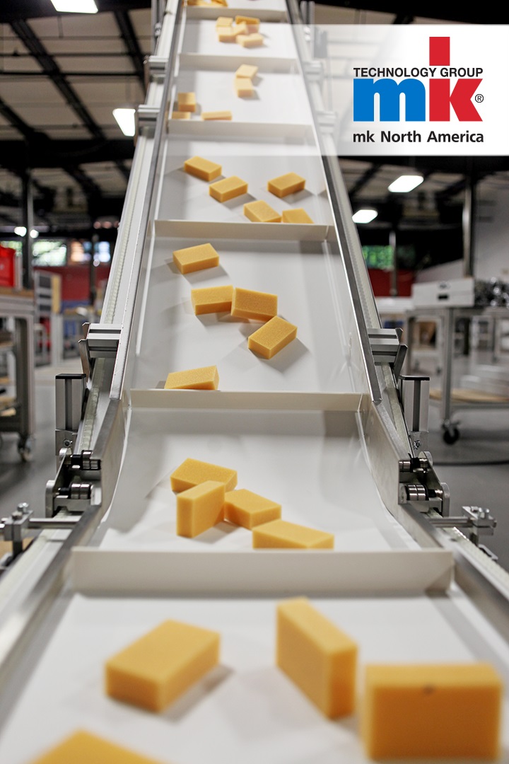 Custom incline conveyor system in action, from mk North America