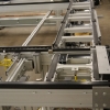 Pallet conveyor system with various conveyor types.