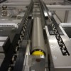 Accumulating roller chain conveyor