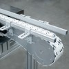 Flexible chain conveyor with side rails