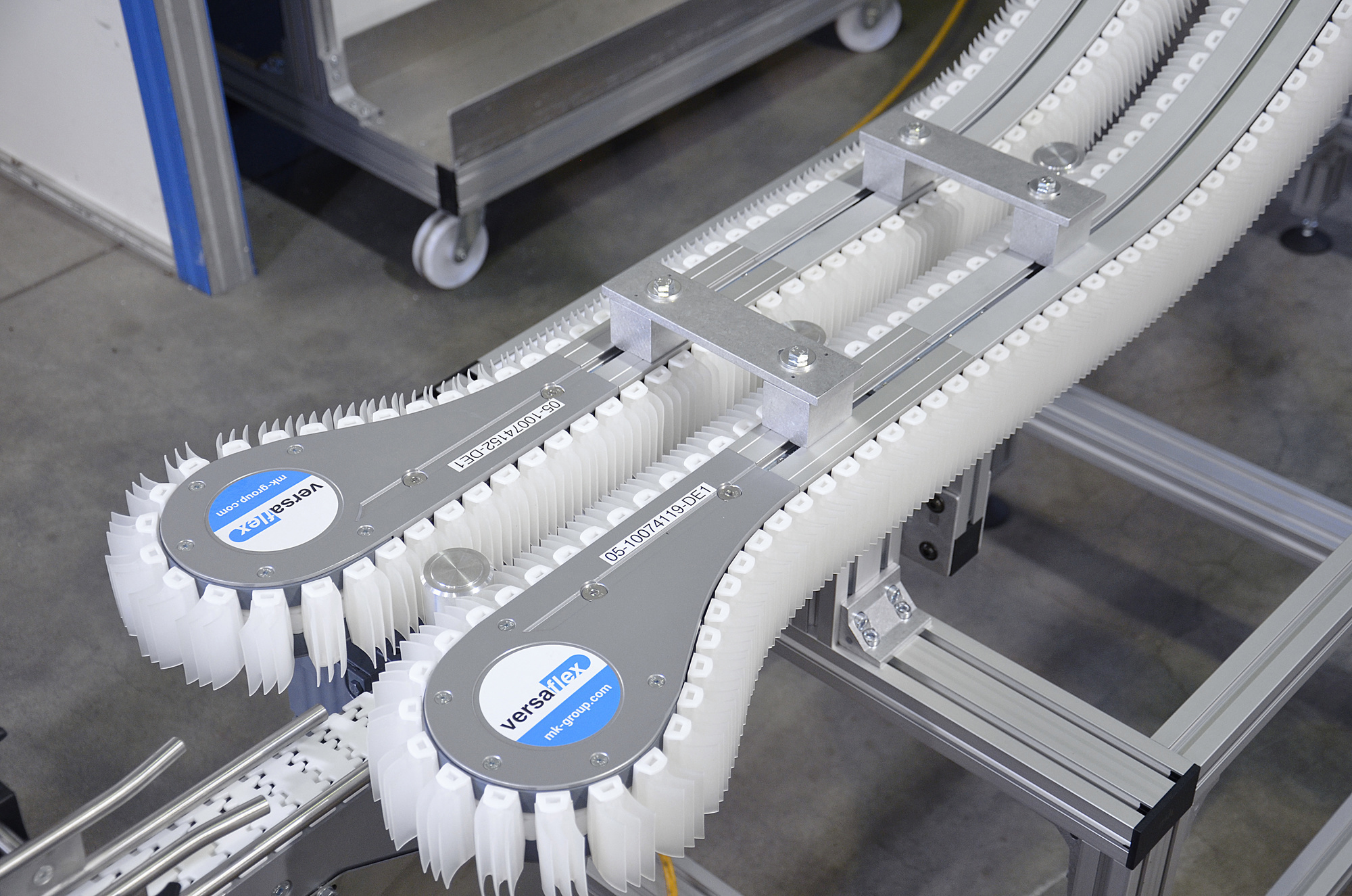 This image displays the conveyor solution created in order to keep the batteries upright during production