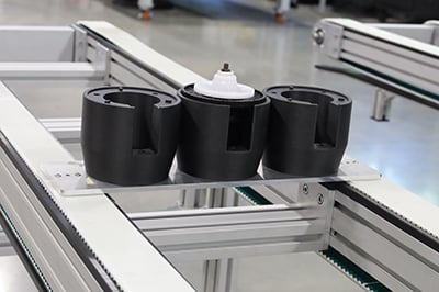 Custom fixtured timing belt conveyor