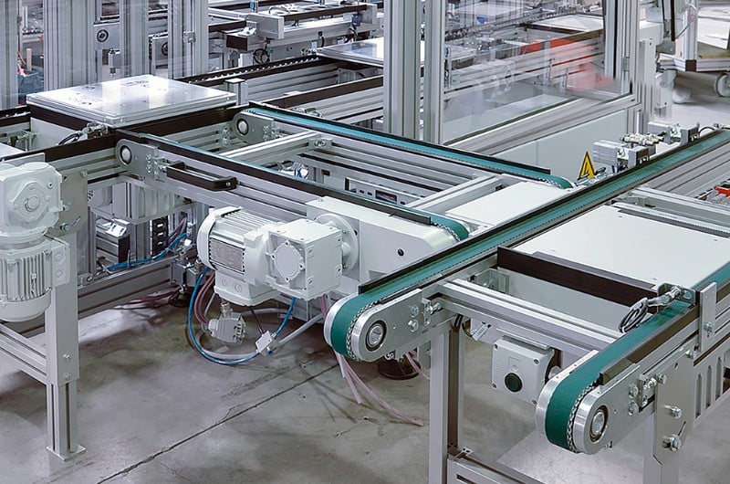 A lift gate conveyor as part of a pallet-handling conveyor system