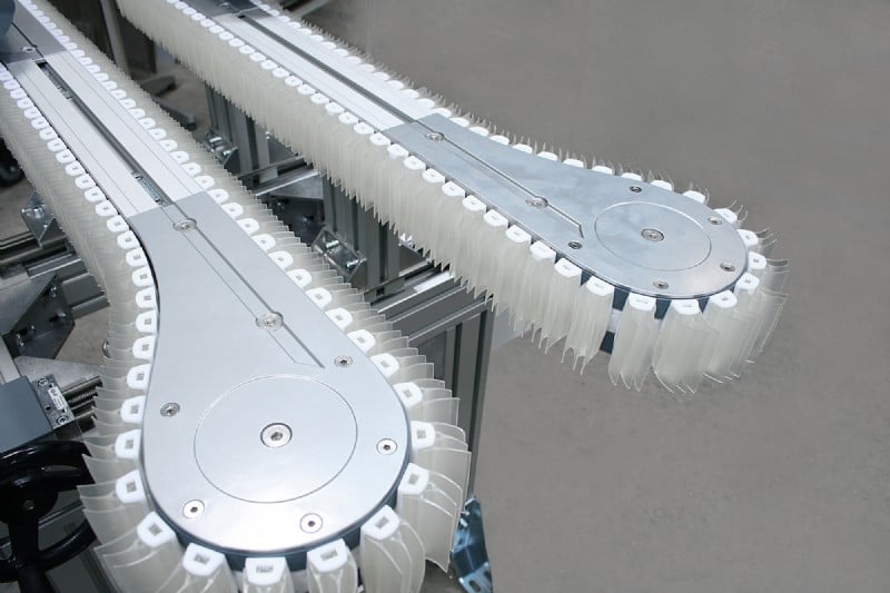 side gripper conveyor with clear grippers