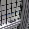 PVC wire mesh held in t-slot with panel clip