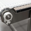 White plastic modular belt stainless steel conveyor with bead rail