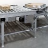 Powered roller conveyors with turn table
