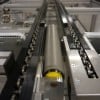 Accumulating roller chain conveyor