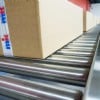 Roller conveyor carrying box