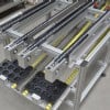 Over under pallet conveyors with roller return