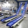 Inclined plastic modular belt conveyors with blue belts