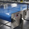 Stainless steel conveyor with clean in place system