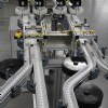 Four lanes of flexible table top chain conveyors