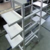 Flat finish aluminum extrusion made into a custom cart with shelves