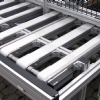 Multi-lane flat belt conveyor with white belts