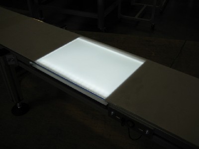 Light panel on conveyor glowing