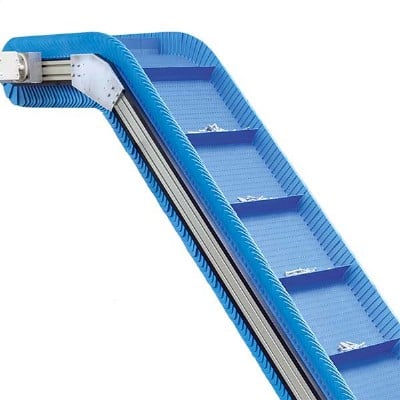 plastic modular belt conveyor conveying products up an incline then horizontally