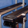 A custom mesh belt on a low profile belt conveyor.