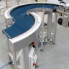 Two curve belt conveyors to form an s-configuration Two curve belt conveyors set up in an "S fashion"