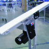 GUF-P MINI center drive conveyor An inclined flat belt conveyor.